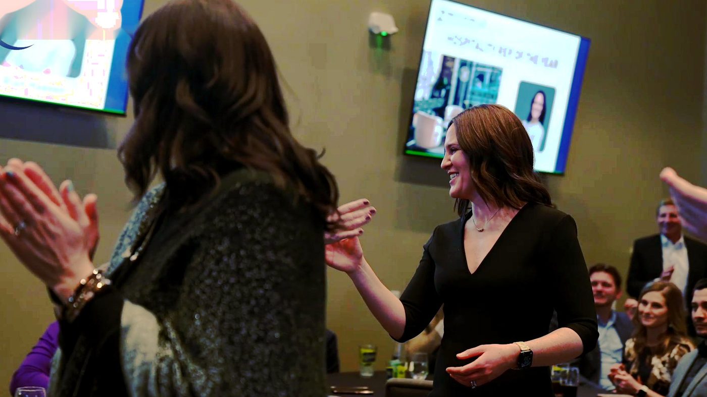 Members networking at the Taproom bar