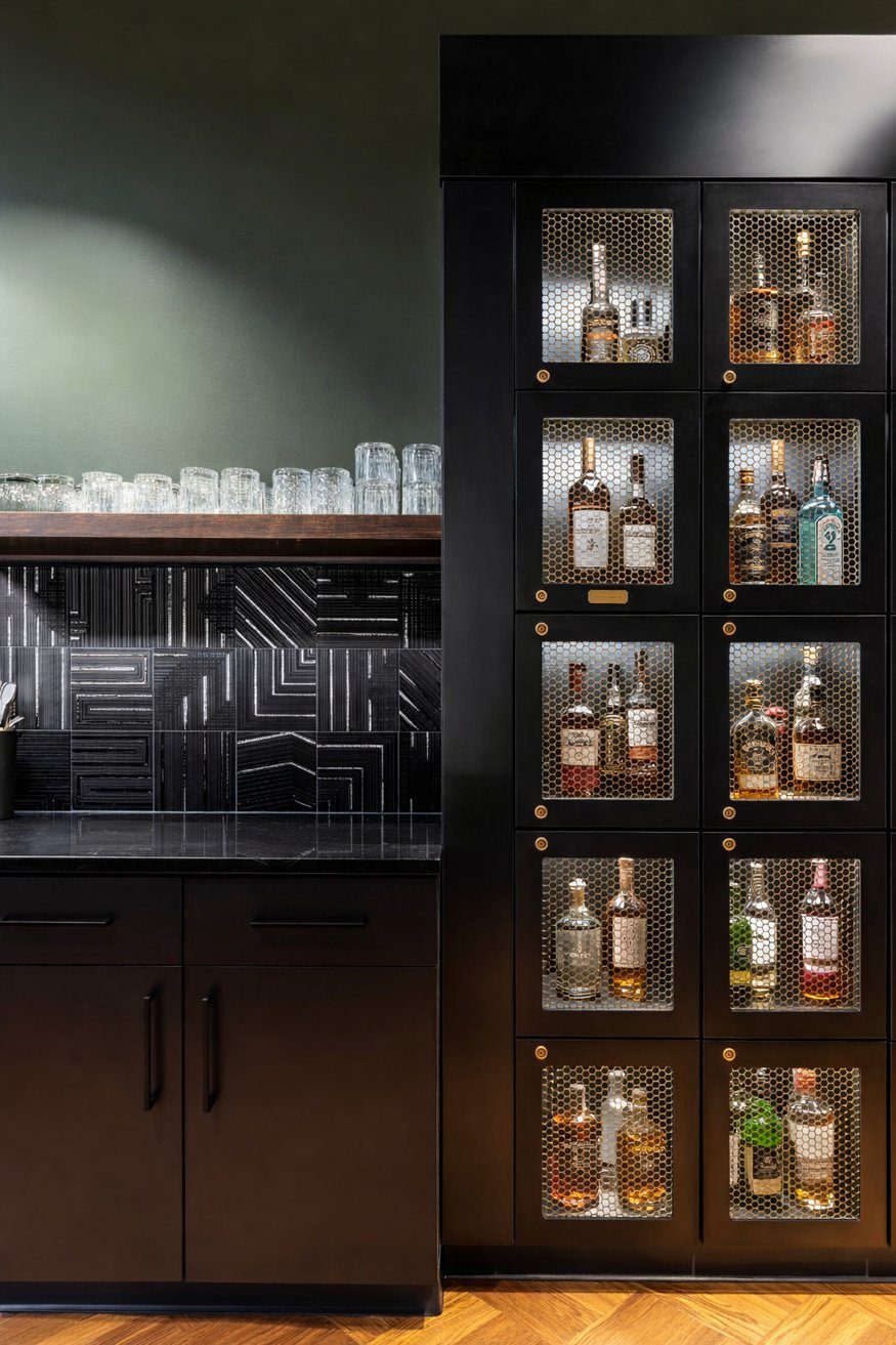Bourbon lockers filled with bottles at the C-Suite Lounge at Revelance Mason Ohio