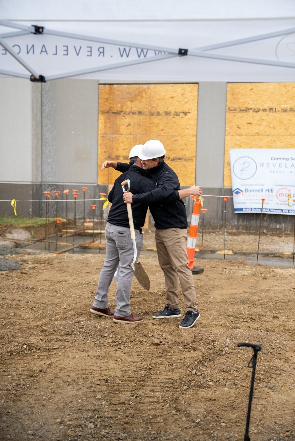 Patrick and Joe embrace at groundbreaking