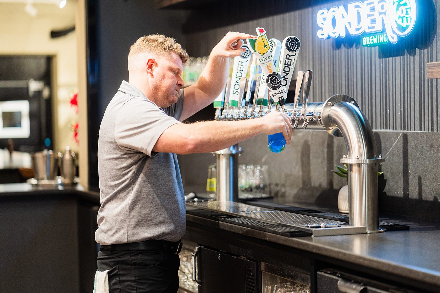 Sonder Brewing bartender pouring craft beer at The Taproom at Revelance Mason Ohio